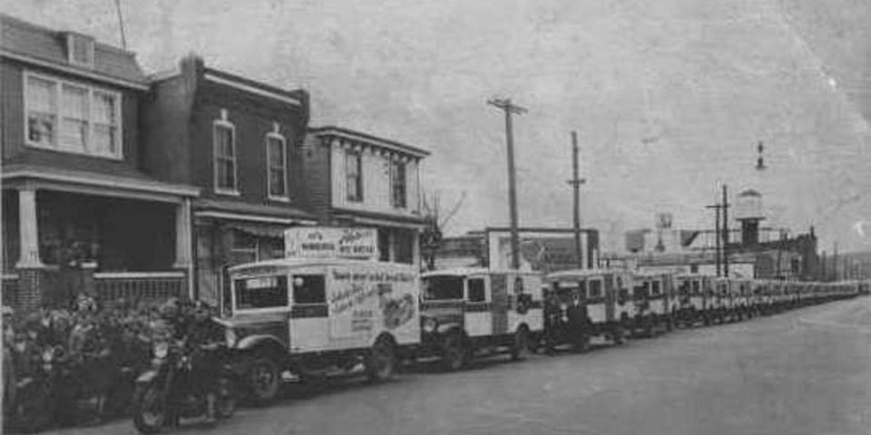 Huber delivery trucks lined up on DuPont Street in Wilmington DE CIRCA 1925
