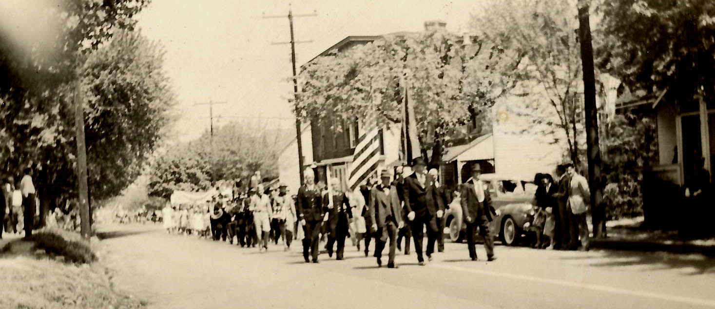 Parade along Main Street near Elm Street in Newark Delaware circa 1940s - 2