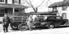 Seaford Delaware State Police Troopers stand with a woman and her trailer of chickens circa mid 1930s