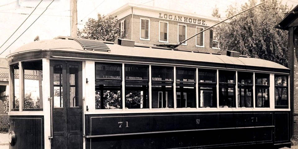 TROLLY IN FRONT OF THE LOGAN HOUSE IN WILMINGTON DELAWARE CIRCA