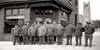 US Postal workers pose in front of the Union Street Post Office in Wilm ington Delaware circa 1940s