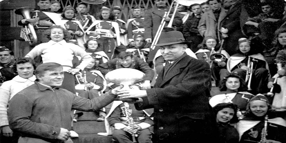WILMINGTON HIGH SCHOOL FOOTBALL TEAM CAPTAIN RECEIVING TROPHY FOR WIN VS PS DUPONT HS IN DELAWARE 1939